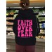 Hooded long sleeved fleece sweatshirt with Faith Over Fear print