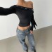 Slanted shoulder long sleeved solid color versatile top for women