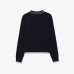 Color blocked short sleeved polo knit top with stitching