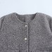 Golden button embellished pearl leather jacket