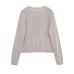Solid color round neck long sleeved knitted sweater