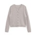Solid color round neck long sleeved knitted sweater
