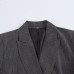 Shoulder padded double breasted suit