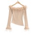 One shoulder slanted hem long sleeved top