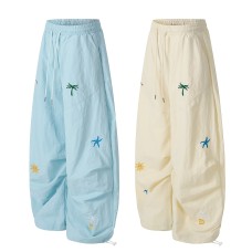 Star embroidery curved knife casual pants for women