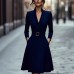 Solid color waist cinched V-neck long sleeved dress with large swing