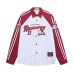 Polo collar shirt with contrasting letter embroidery and raglan sleeves Polo collar shirt with contrasting letter embroidery and raglan sleeves