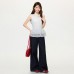 White Polka Dot BM Style Ruffle Spliced Hem Sleeveless Top
