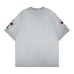 Embroidered metal cross washed short sleeved shirt with letters