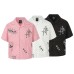 Cross letter printed lapel short sleeved shirt
