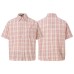 Pink checkered hem with frayed edge design and a lapel short sleeved shirt