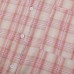 Pink checkered hem with frayed edge design and a lapel short sleeved shirt