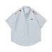 Embroidered vertical striped short sleeved shirt