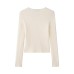 Asymmetric buckle knitted jacket on the street
