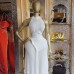 Hanging neck sleeveless pleated slim fit mid length dress Hanging neck sleeveless pleated slim fit mid length dress