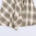Versatile asymmetrical plaid MIDI skirt