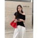 Tencel cotton single-sided off shoulder twisted design short sleeved spring style slimming top