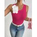 Three dimensional flower decorated sleeveless top
