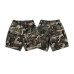 Washed and hand cut camouflage shorts