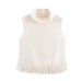 Commuter style design with tassel embellishment shoulder pad top