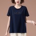 Embroidered short sleeved round neck top with sequins