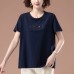 Embroidered short sleeved round neck top with sequins