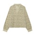 Retro style hollowed out embroidered long sleeved shirt
