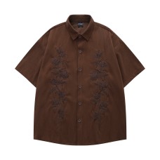 Rose embroidery embellishes short sleeves