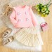 Long sleeved top flower bud short skirt set