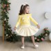 Long sleeved top flower bud short skirt set