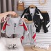 Leisure suit children's color blocked long sleeved three piece set