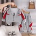 Leisure suit children's color blocked long sleeved three piece set