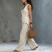 Sleeveless V-neck waist cinched top paired with wide leg pants set Sleeveless V-neck waist cinched top paired with wide leg pants set