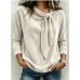 Solid color long sleeved bow top