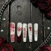 Gothic Butterfly Festival wearing long ladder nail stickers