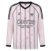 Color blocked V-neck football style long sleeved jersey
